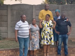 Joyous: From left ,Mr Mankwe Raphela and his  wife Refiloe; (middle), Sgt Ramara and his  wife Lerato; and Mr Zacharia Raphela and his wife