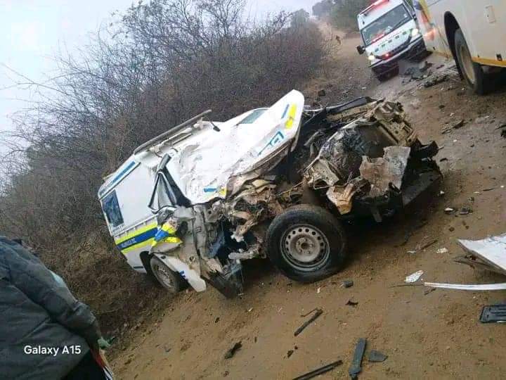 Police van collided head-on with a bus