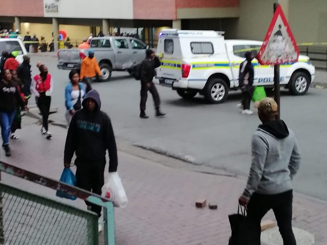 Taxi patroller shot and killed in a busy Pan African Mall in Alex. His colleague was rushed to a hospital after he was also shot